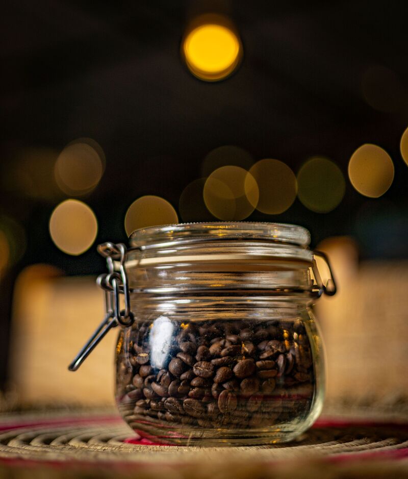 Fresh coffee beans stored in an airtight container